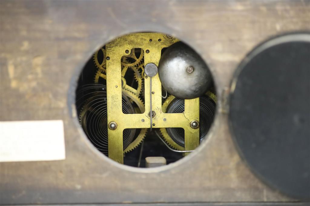 An American ebonised mantel clock, length 46cm